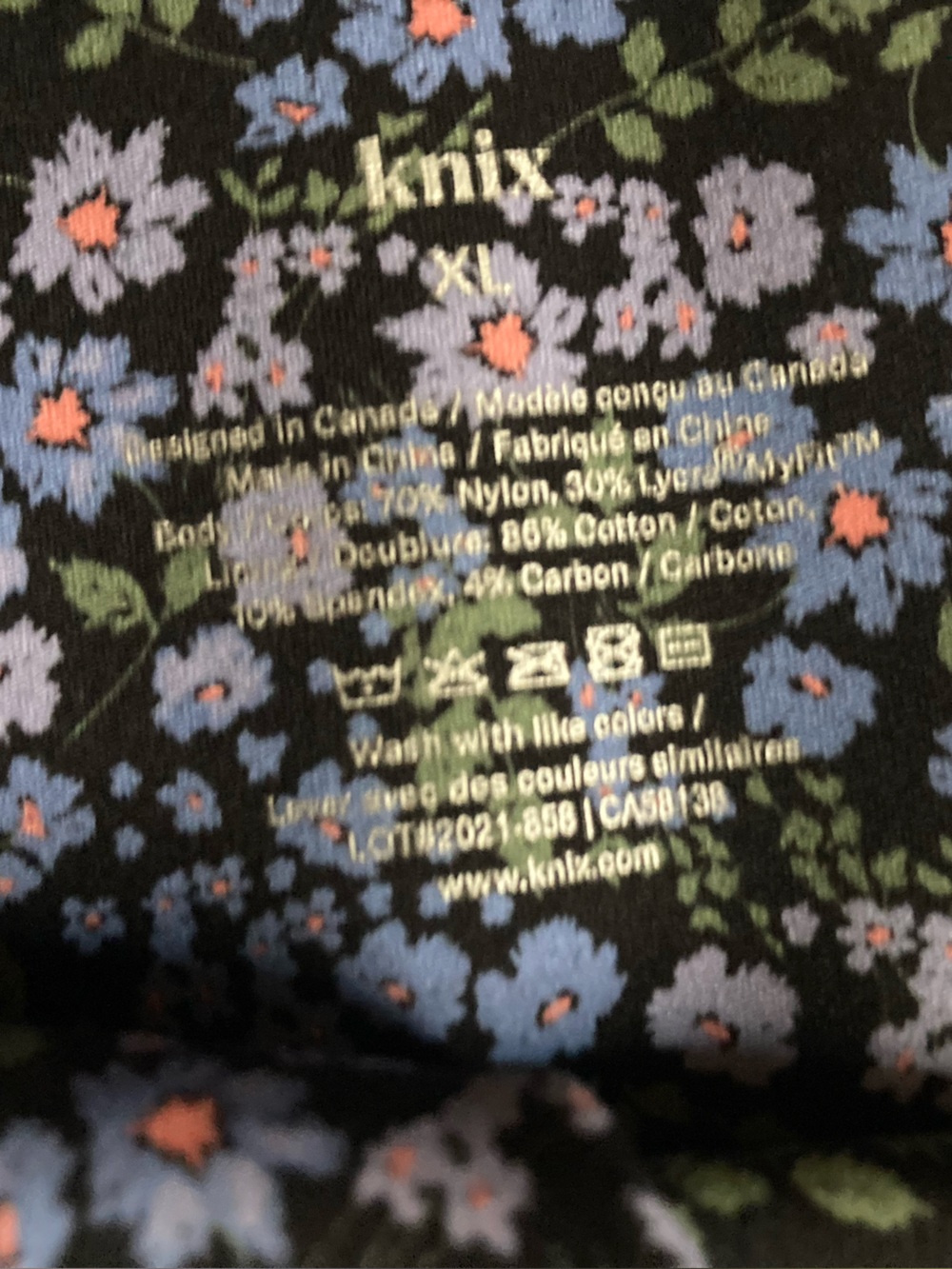 Knix. Garden Daze Black Floral Leggings with Purple and Lavender Print - Picture 4 of 4
